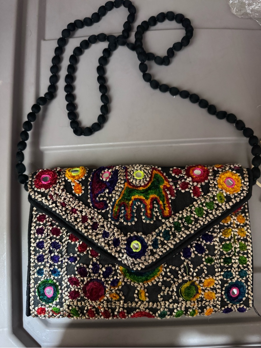 Ethnic Indian Wear Black Embroidered Elephant Crossbody with Multicolor Accents